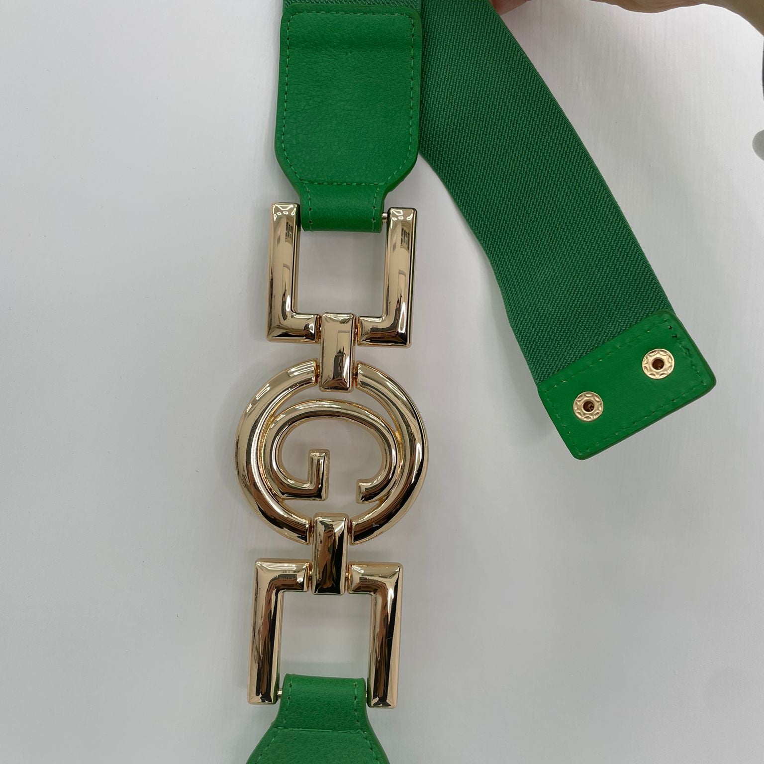 Cintura con fibbia a forma di "G" oro