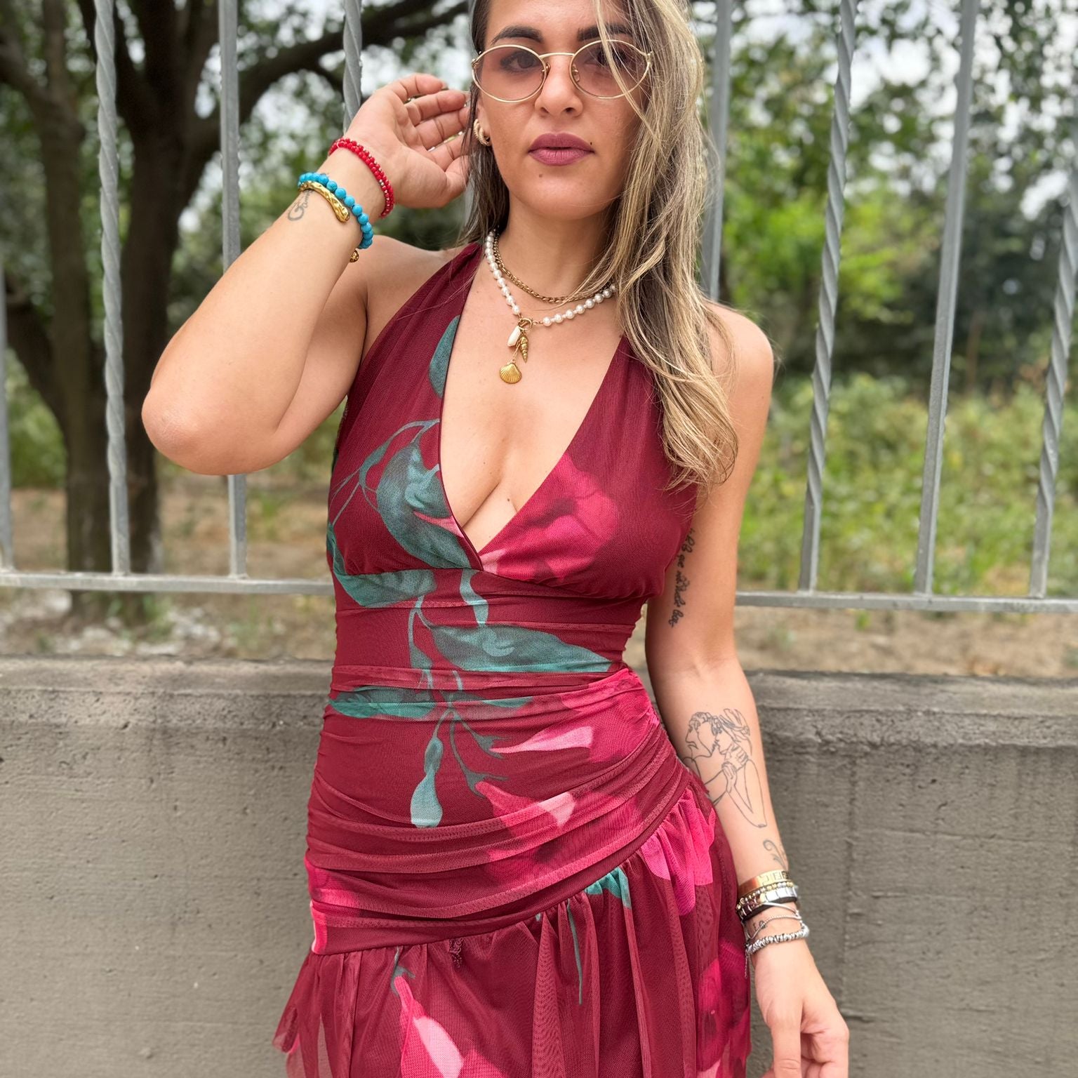Vestitino velato a fantasia con rouches