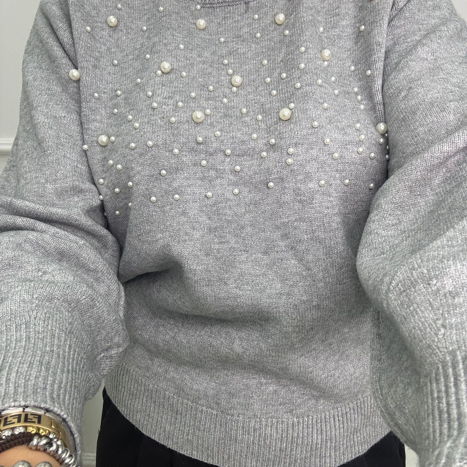 Maglione con perle nella parte superiore