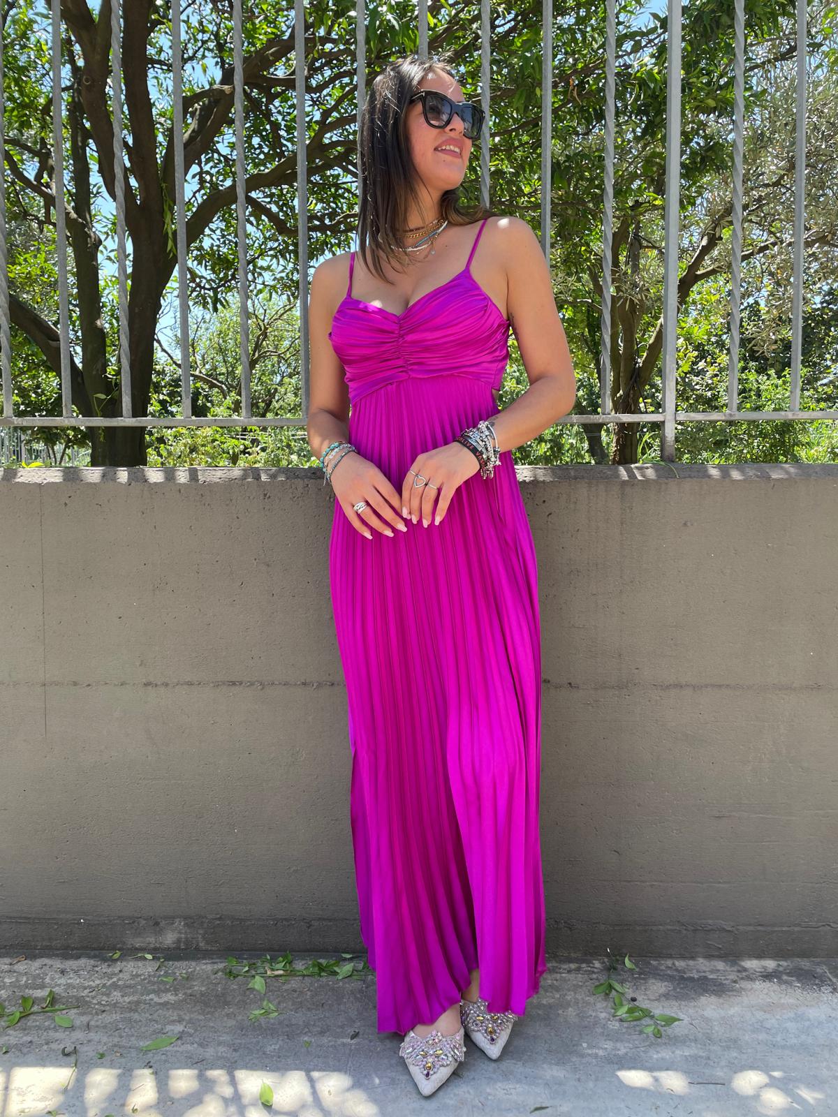 Vestito lungo in simil raso plissettato con fiocco dietro