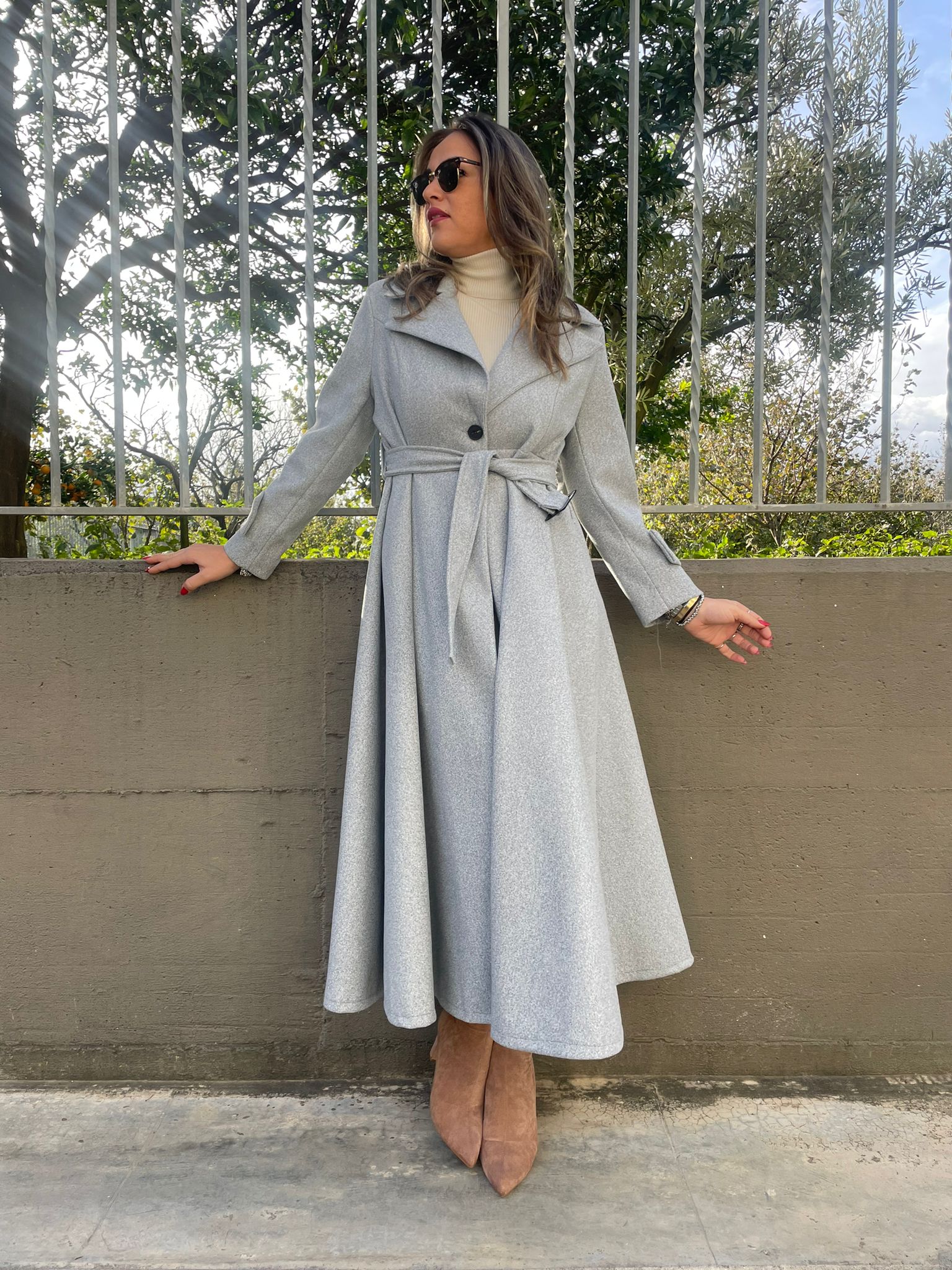 Cappotto lungo tinta unita scampanato