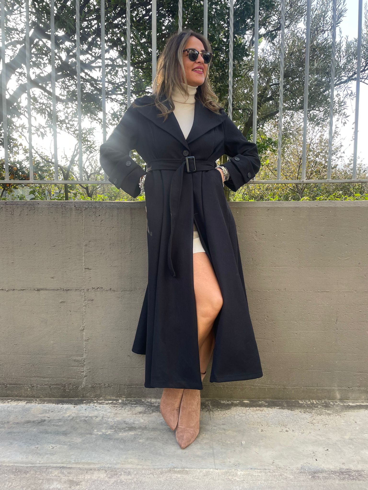 Cappotto lungo tinta unita scampanato