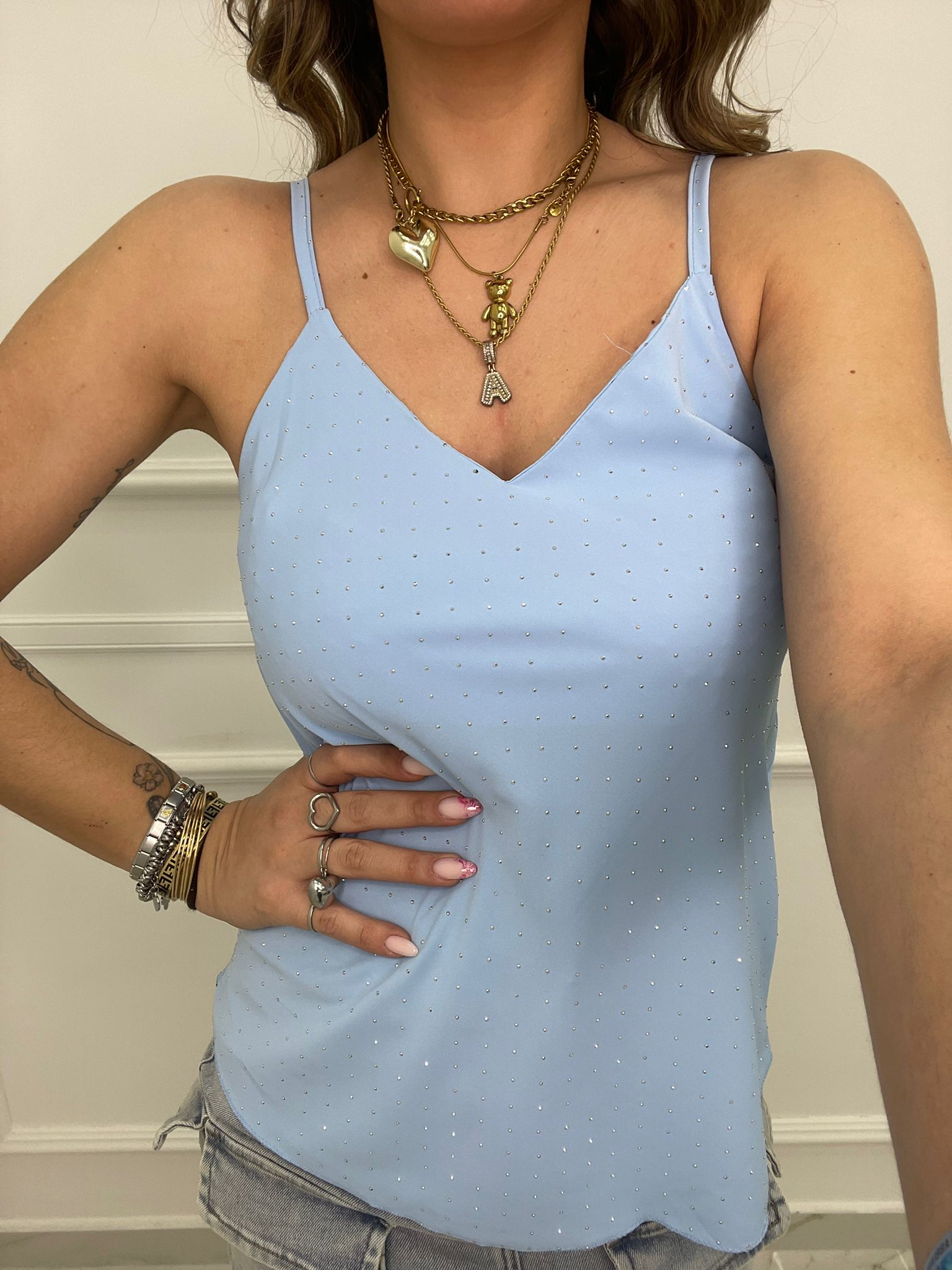 Top tinta unita con swarovski