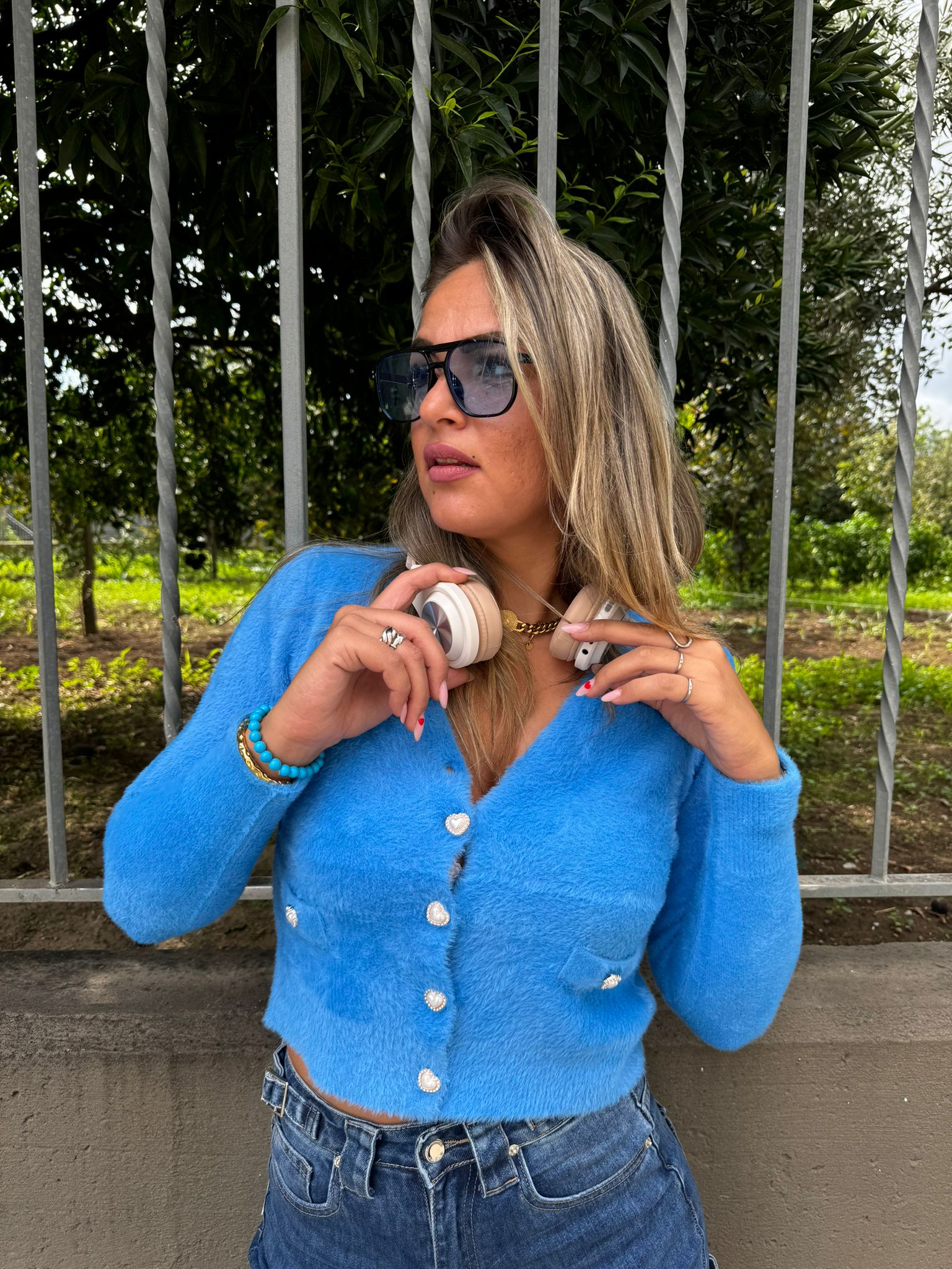 Cardigan in pelo con bottoni swarovski