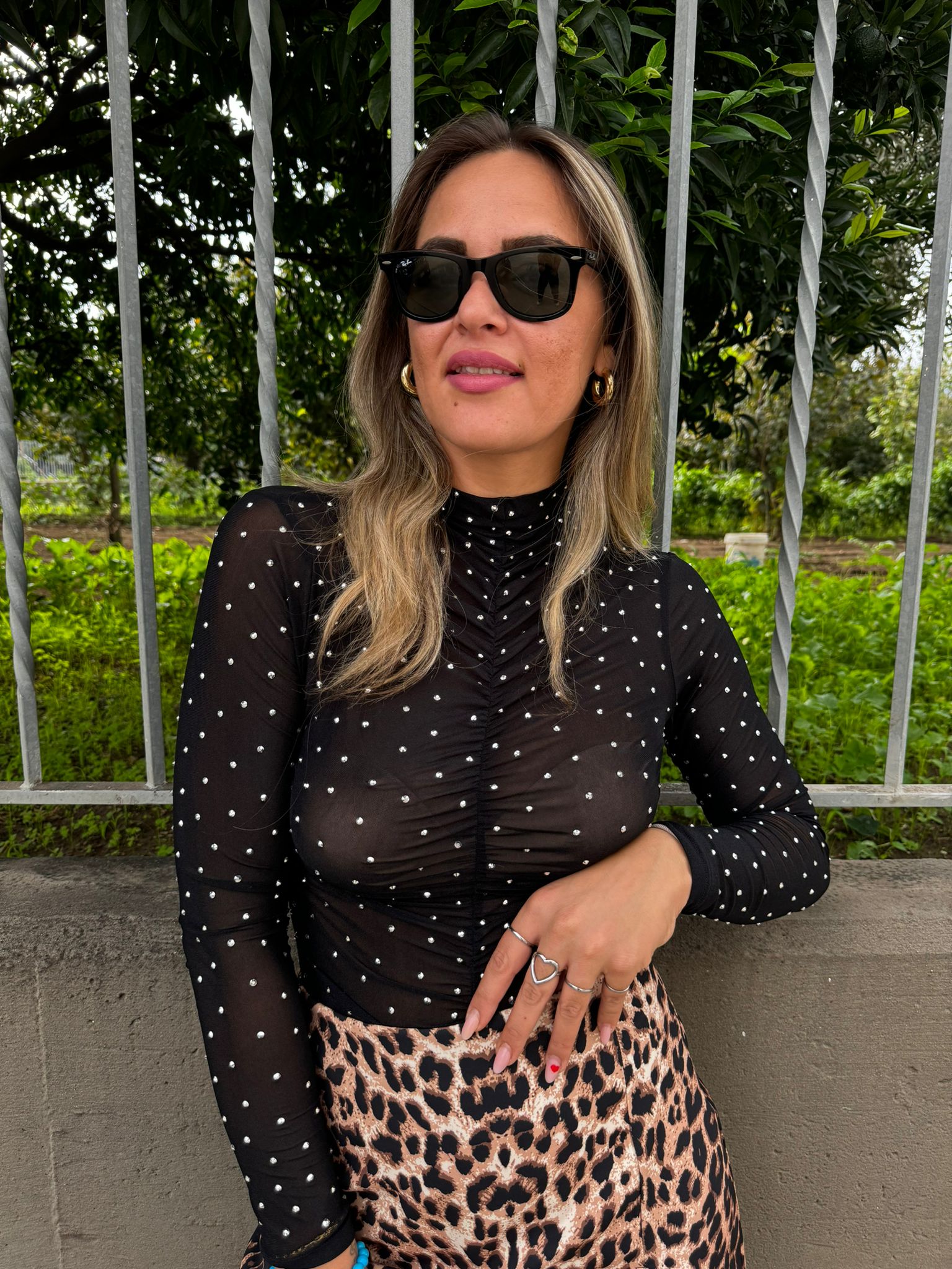 Body nero velato con brillantini