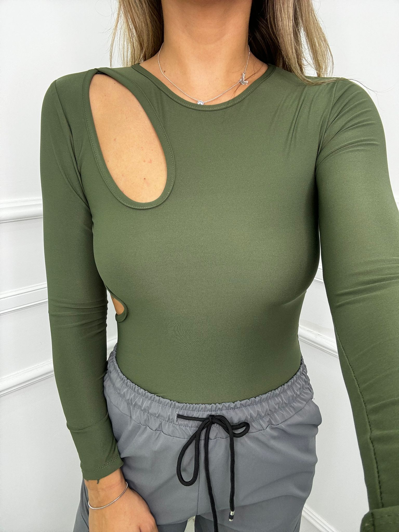 Body in lycra tinta unita con apertura laterale