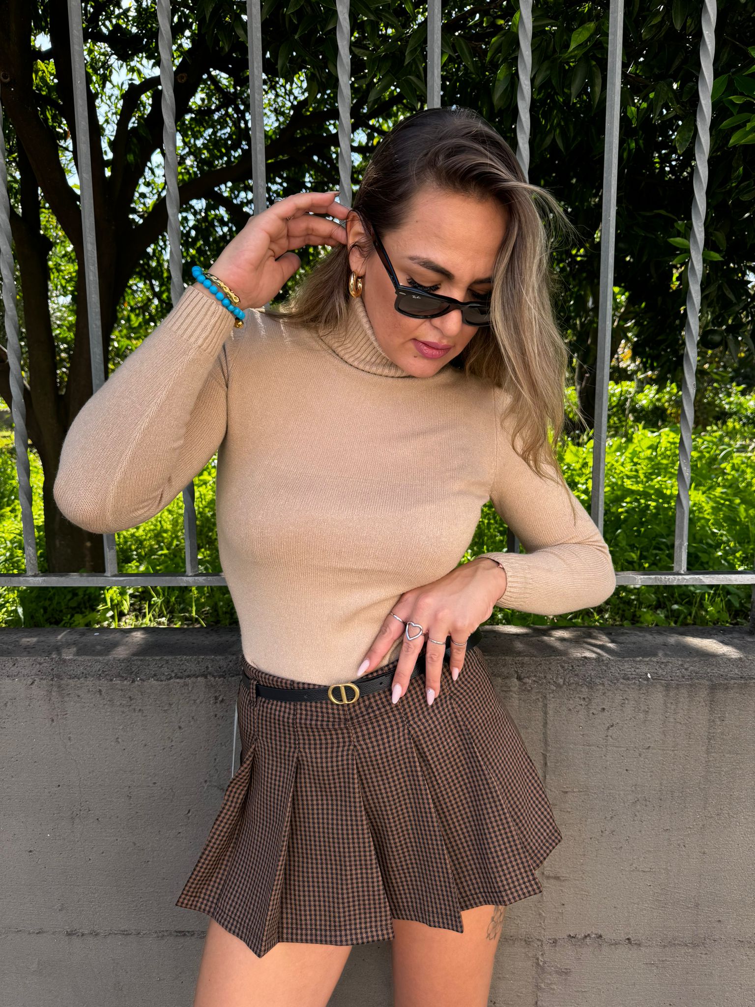 Mini gonna a pantaloncino fantasia tartan plissettata