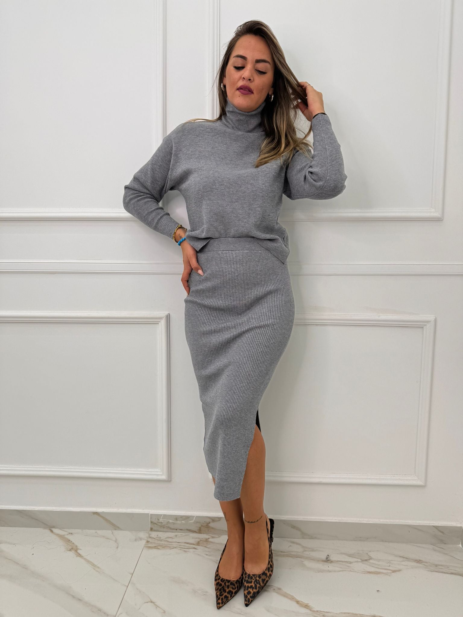 Coordinato 2 pezzi con longuette e maglia collo alto