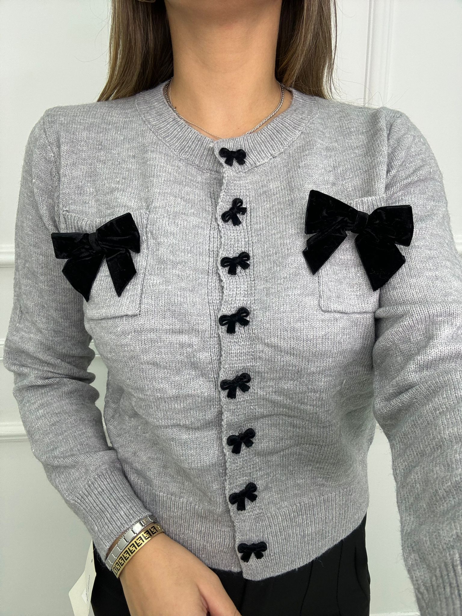 Cardigan con fiocchi in velluto