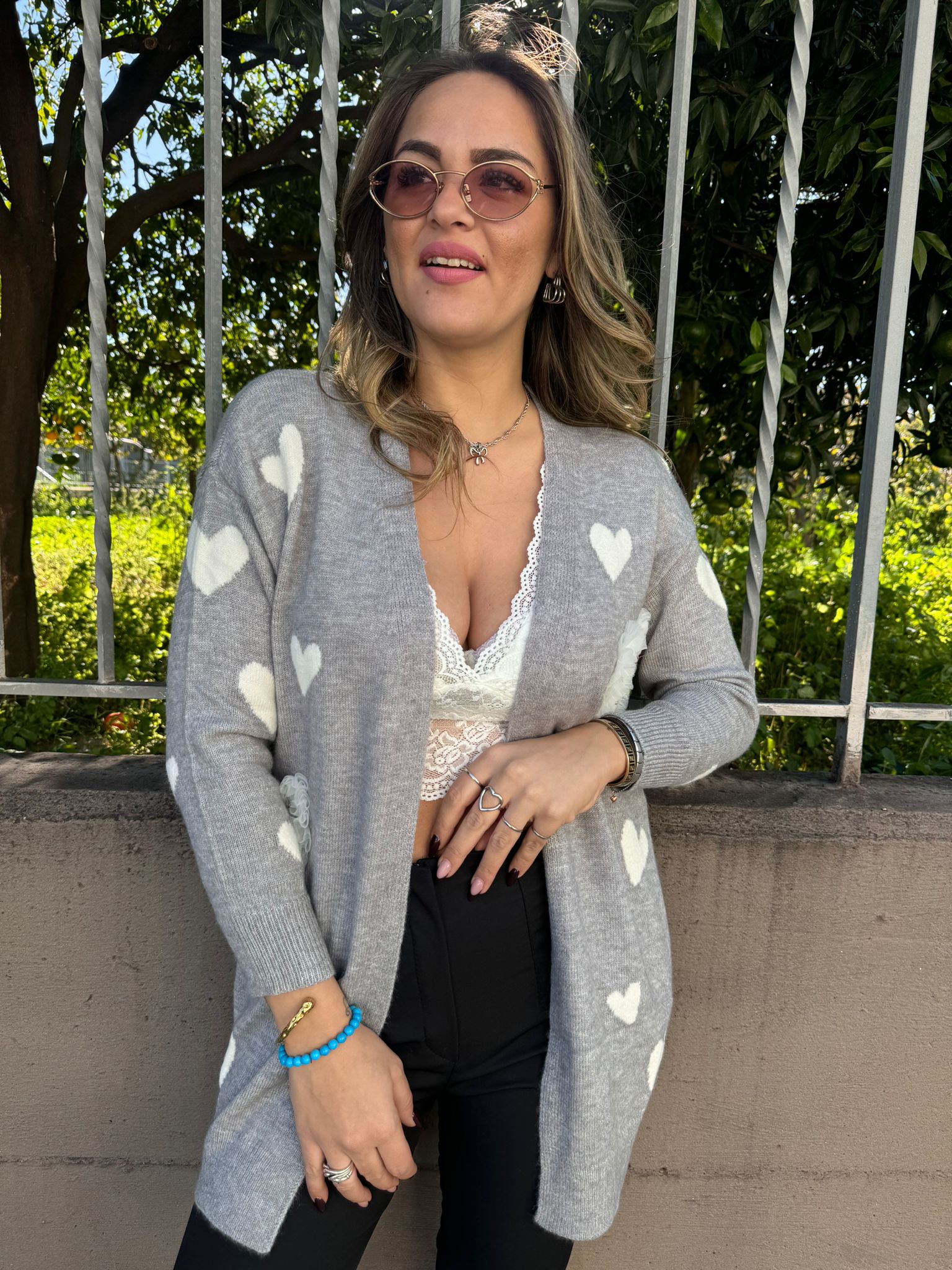 Cardigan aperto con cuori