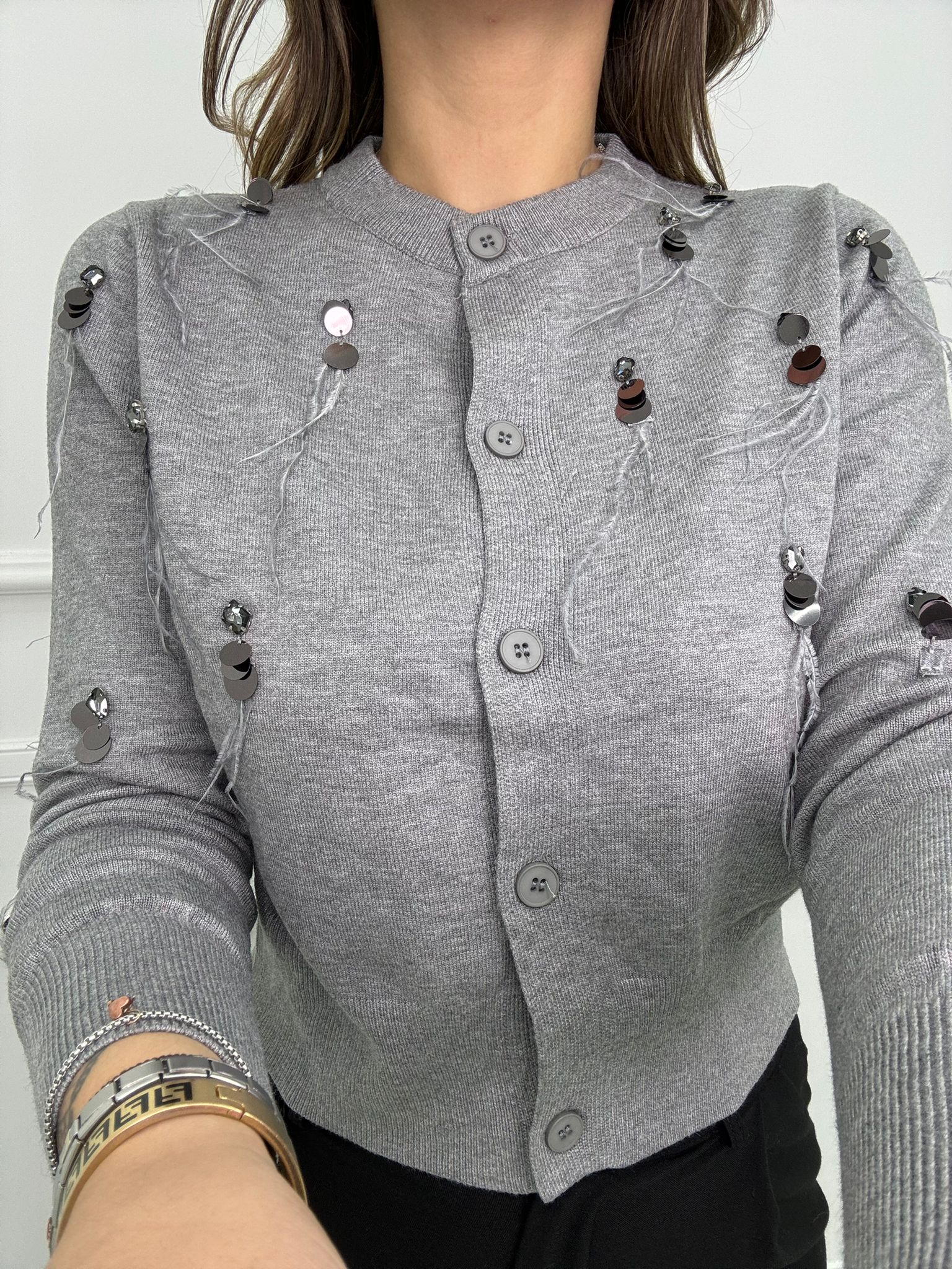 Cardigan giro collo con piume e paillettes
