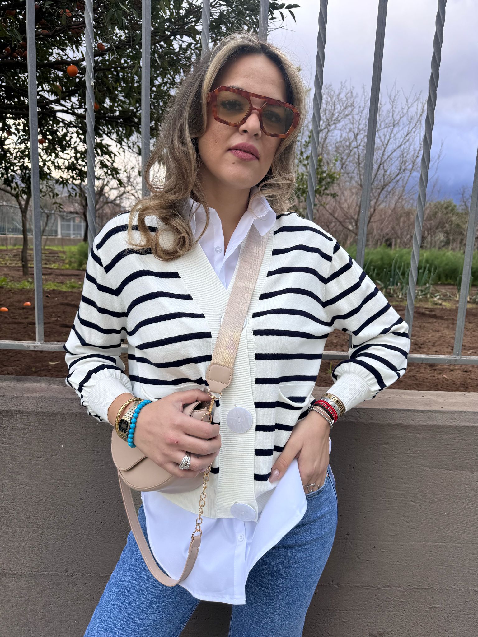 Cardigan in filo over a righe