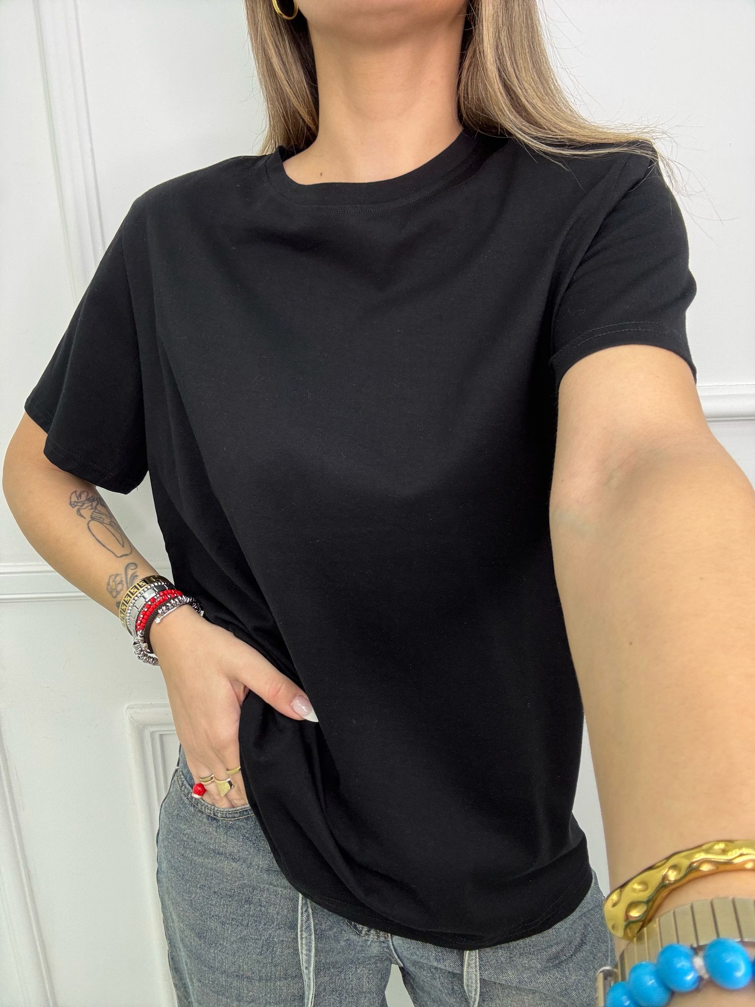 T-shirt over con spalline