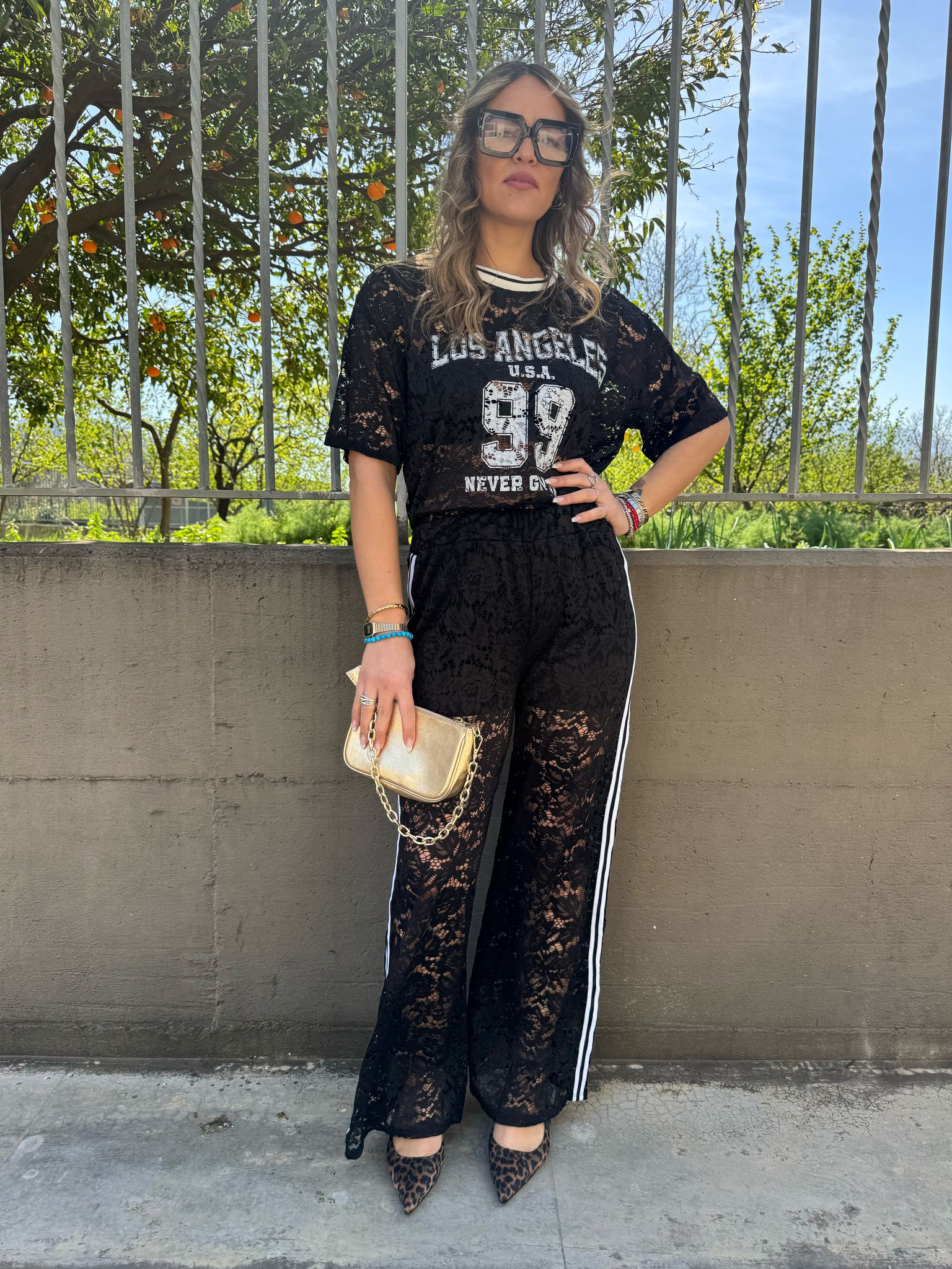 Coordinato 2 pezzi in pizzo con pantalone palazzo