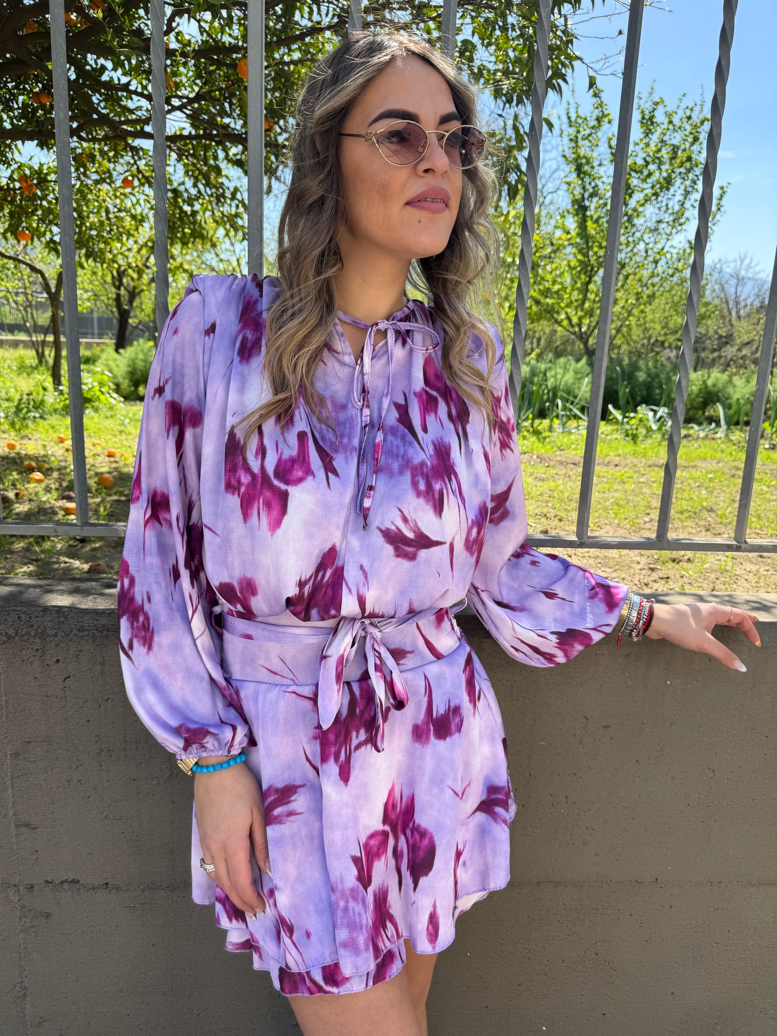 Vestitino a fantasia con rouches e spalline