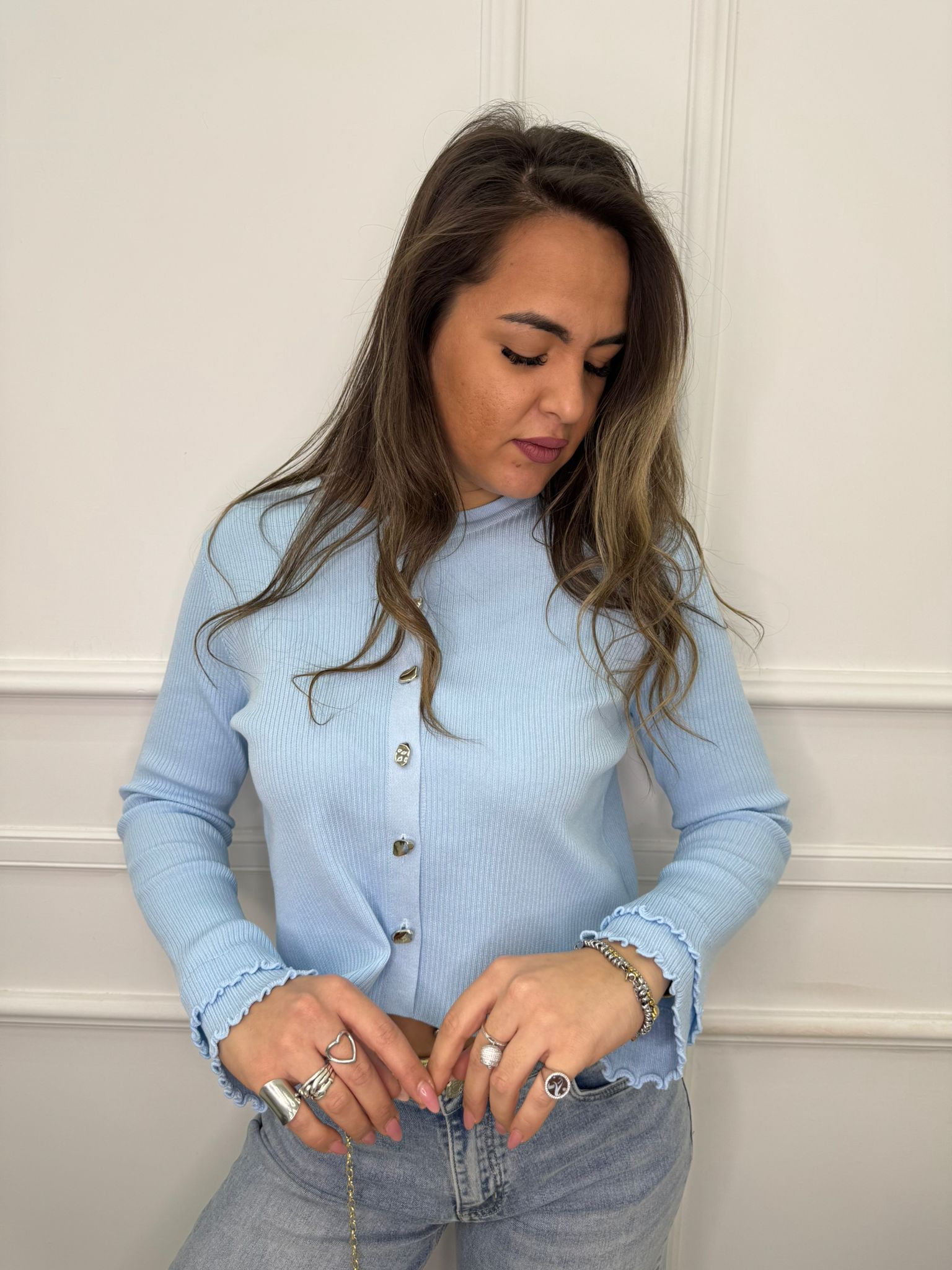 Cardigan taglio dritto con polsini particolari