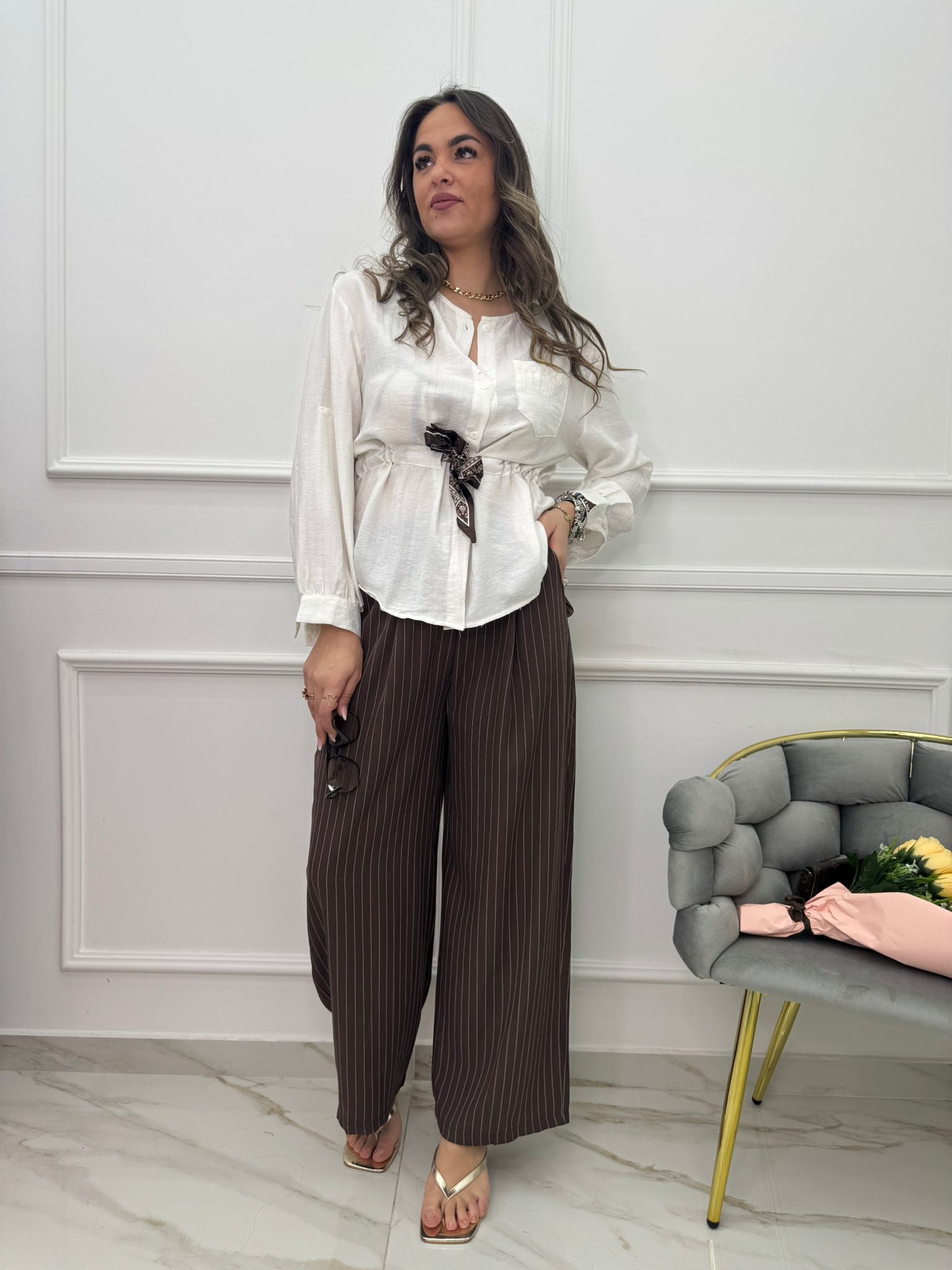 Pantalone palazzo a righe con cintura