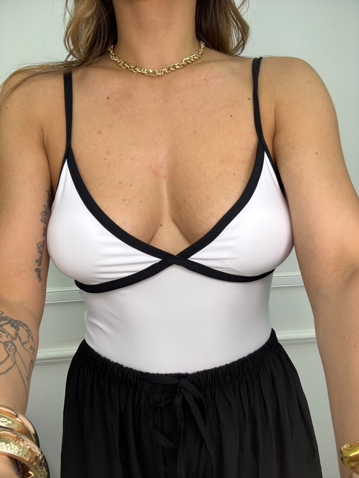 Body in lycra con bordi in contrasto