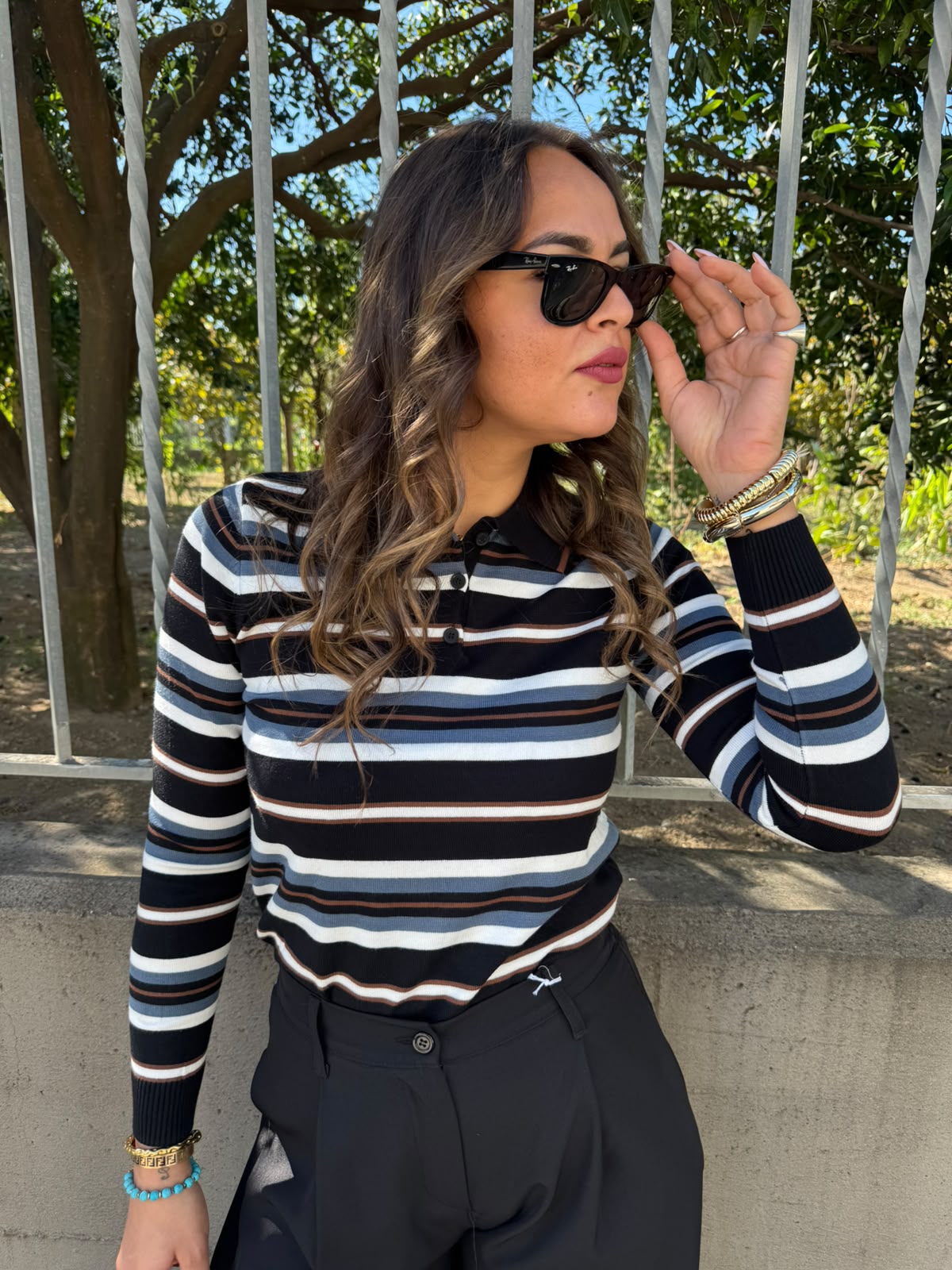 Maglia in lana modello polo a righe