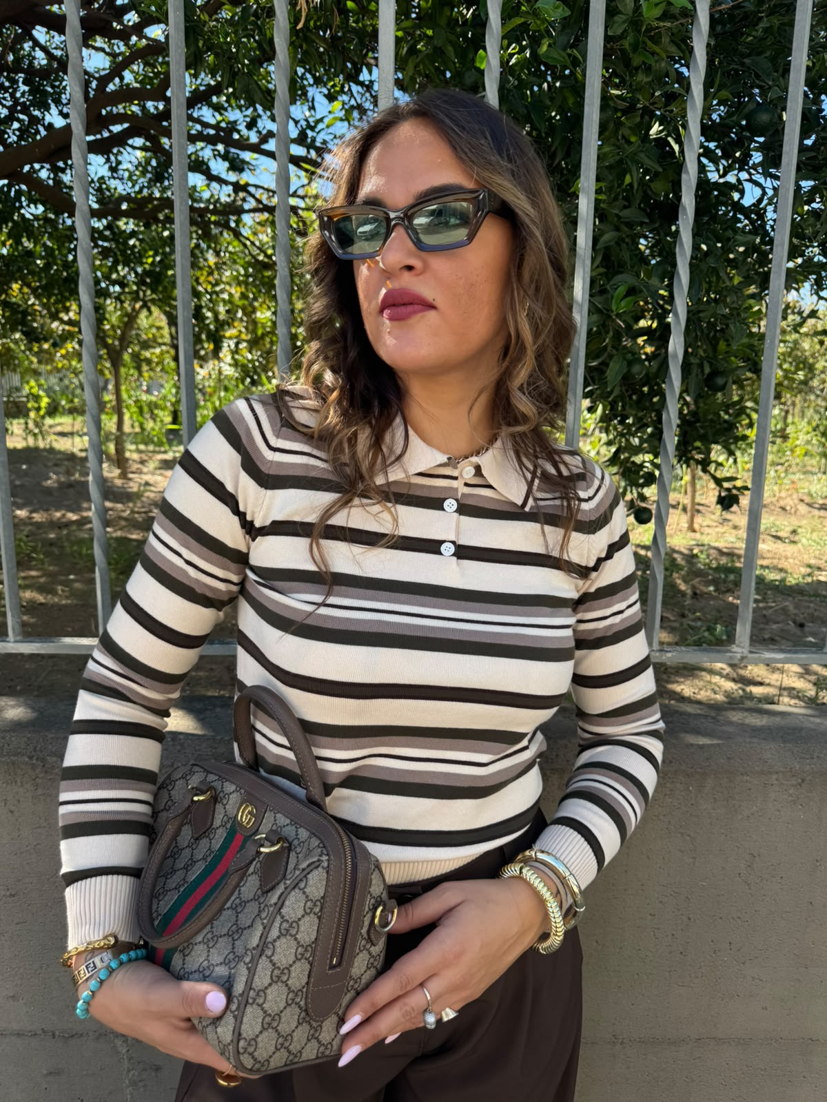 Maglia in lana modello polo a righe