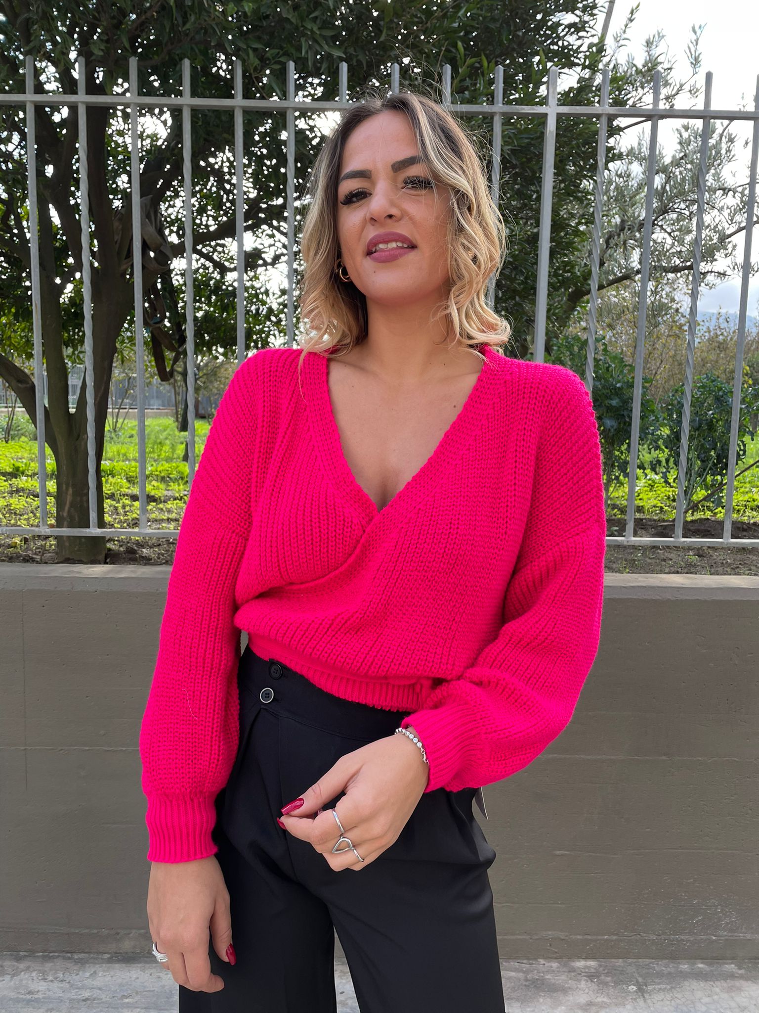 Maglione a incrocio tinta unita